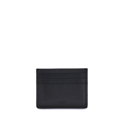 Ferragamo Black Calf Leather Bos Taurus Wallet with Gancini ornament, elegant and compact card holder AW25 season.