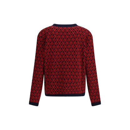 Back view of Valentino Multicolor Fleece Wool Cardigan with V logo pattern and ribbed hems, showcasing elegant design details.