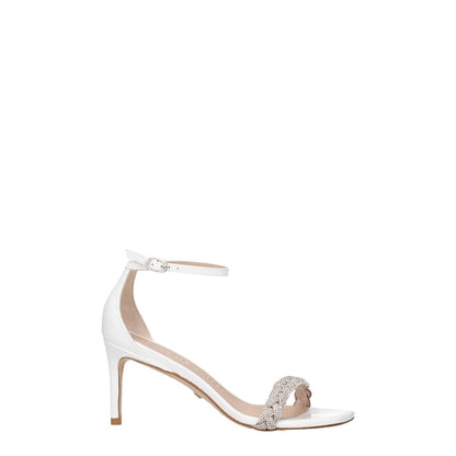 Stuart Weitzman White Leather Stiletto Heel Sandals with mid heel, buckle closure, silver accents, and open toe design.