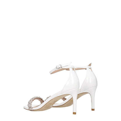 Stuart Weitzman White Leather Stiletto Heel Sandals with buckle closure and open toe design, featuring crystal details on straps.