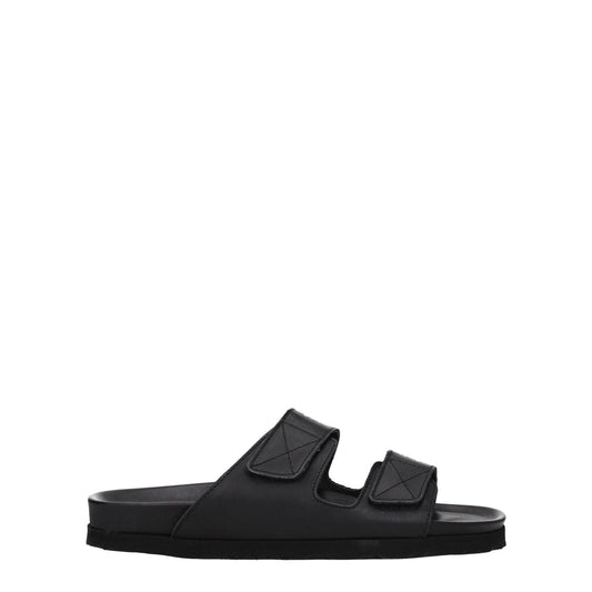 Palm Angels Black Leather Slippers with strap closure, open toe, and rubber sole. Casual style with front logo. MPN PMIH005LEA0011001.