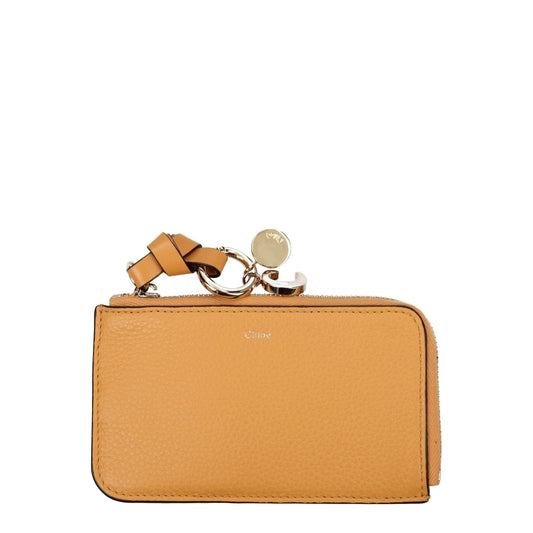 Chloé Orange Leather Wallet with front logo, zip closure, gold accents; casual style coin purse, MPN AP761F57892; dimensions 7.5×13 cm.