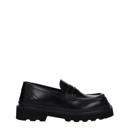 Dolce & Gabbana Black Leather Slip-On Loafers with square toe and mid heels, featuring rubber sole and casual style.