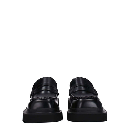 Dolce & Gabbana Black Leather Slip-On Loafers with square toe, mid heels, rubber sole, casual style, front view image.