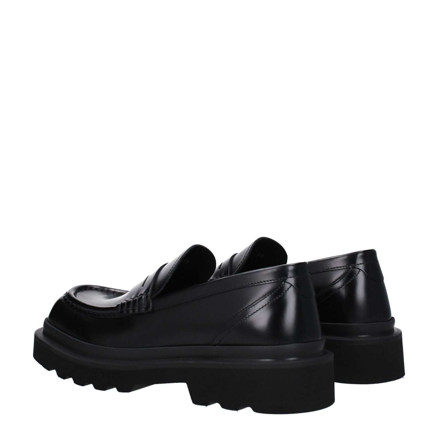 Dolce & Gabbana Black Leather Slip-On Loafers with rubber sole and square toe, side view of casual mid-heel shoes.