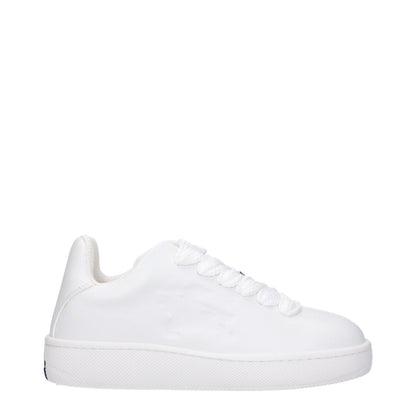 Burberry White Leather Low Top Sneakers with lace-up closure, round toe, rubber sole, and side logo for a sporty glam look.