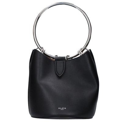 Alaïa Black Leather Handbag with magnetic closure, featuring a removable inner clutch and front logo. Medium size, casual style.