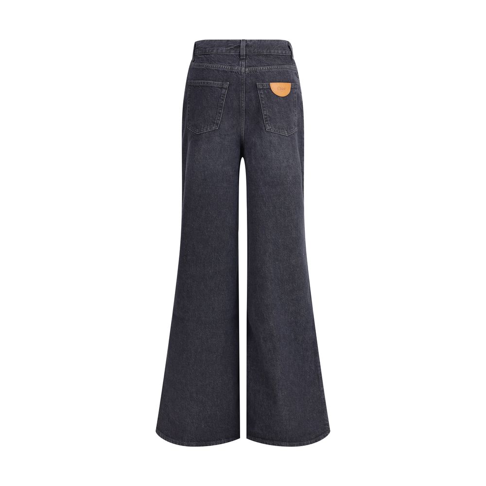 Chloé Black Cotton Flared Jeans with leather logo patch, five-pocket design, mid-rise fit, and flared leg, 100% cotton.