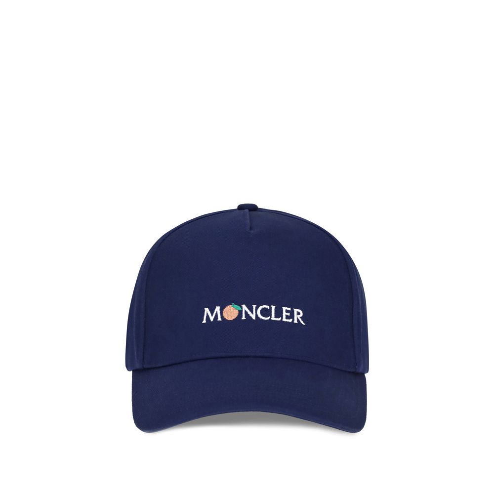 Front view of the Moncler x Donald Glover Blue Cotton Cap (Baseball Hat), featuring a unique logo design, AW25 collection.