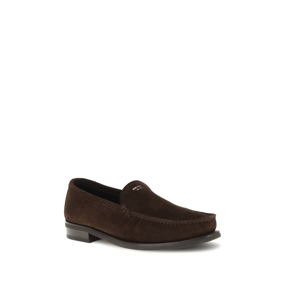 Prada Brown Calf Leather Bos Taurus Slip-On Loafers with suede finish and rubber sole for AW25 season elegance and comfort.