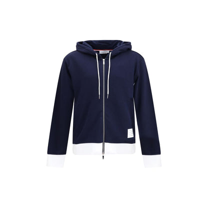Thom Browne Blue Cotton Sweatshirt with hood, zipper, and signature patch, contrasting cuffs and hem, made from 100% cotton in Japan.