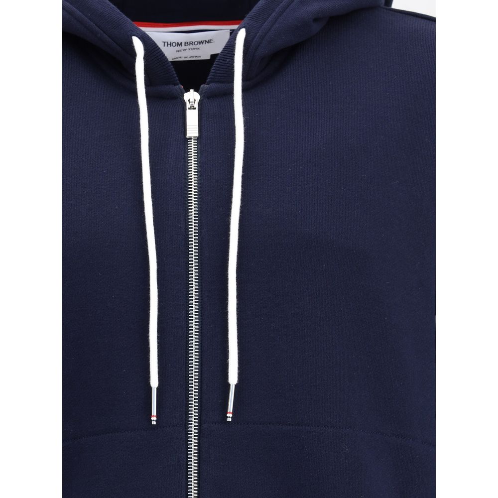 Thom Browne Blue Cotton Sweatshirt with zipper and drawstring hood, featuring discreet pockets and signature patch detail.