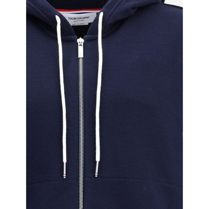 Thom Browne Blue Cotton Sweatshirt with zipper and drawstring hood, featuring discreet pockets and signature patch detail.