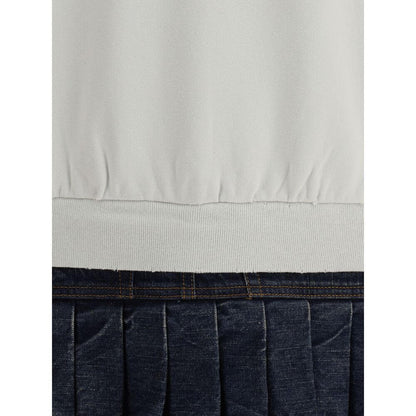 Close-up of Balenciaga Multicolor Cotton Sweatshirt with denim pleated skirt detail highlighting the unique design and texture.