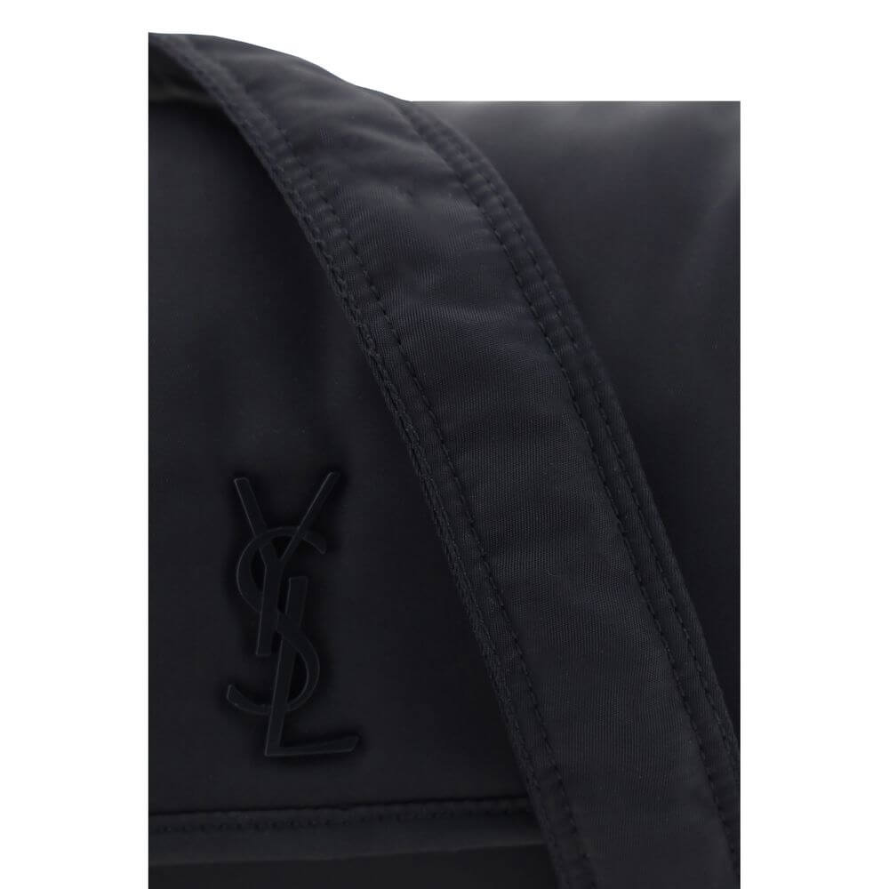 Close-up of the iconic YSL logo on a Saint Laurent Black Polyamide Shoulder Bag.