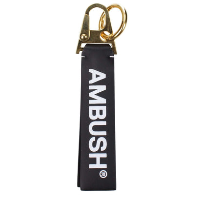 Ambush Black Leather Keychain with vintage effect and logo, MPN BMNF003S22LEA0011076, featuring gold clip and ring.