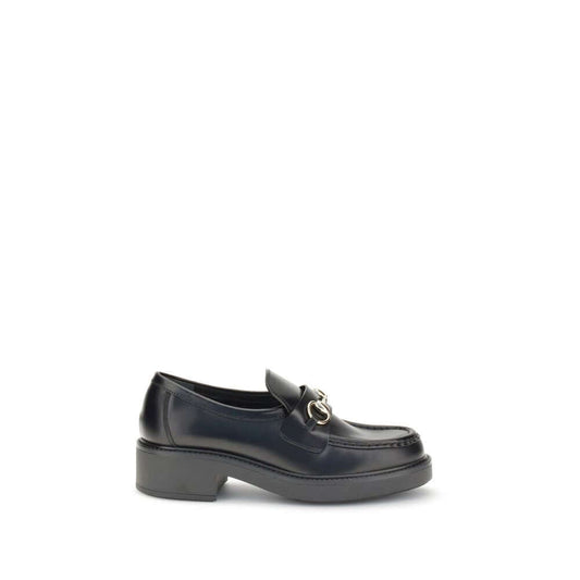 Gucci Black Calf Leather Bos Taurus Slip-On Loafers with horsebit detail and block heel, perfect for formal and everyday style.