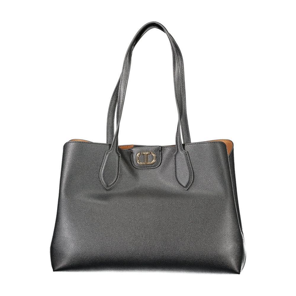 Front view with bag zipped and handles upright.