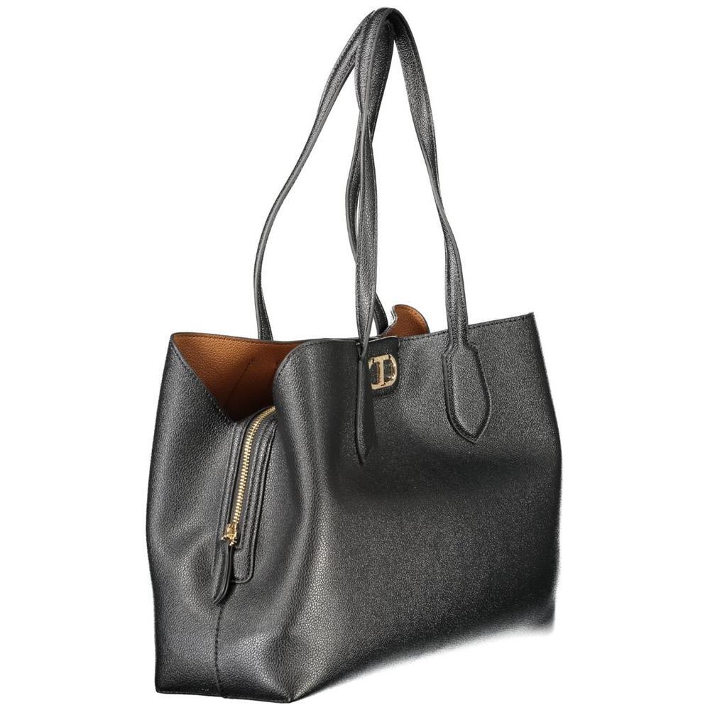 Front view with bag zipped and handles upright.
