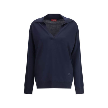 Gucci Blue Wool Sweatshirt featuring classic collar, deep V-neckline, long sleeves, and embroidered logo for casual-chic style.