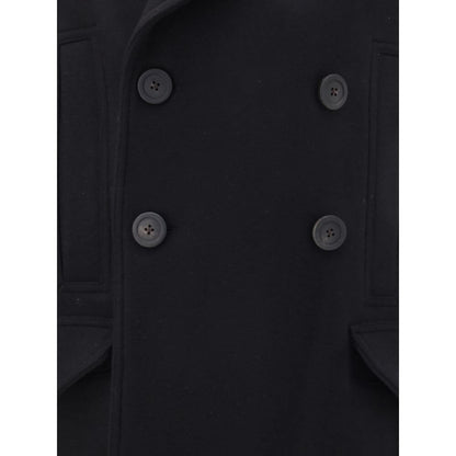 Rick Owens Black Fleece Wool Coat with double-breasted buttons, wide lapels, and welt pockets, showcasing structured elegance for AW25.