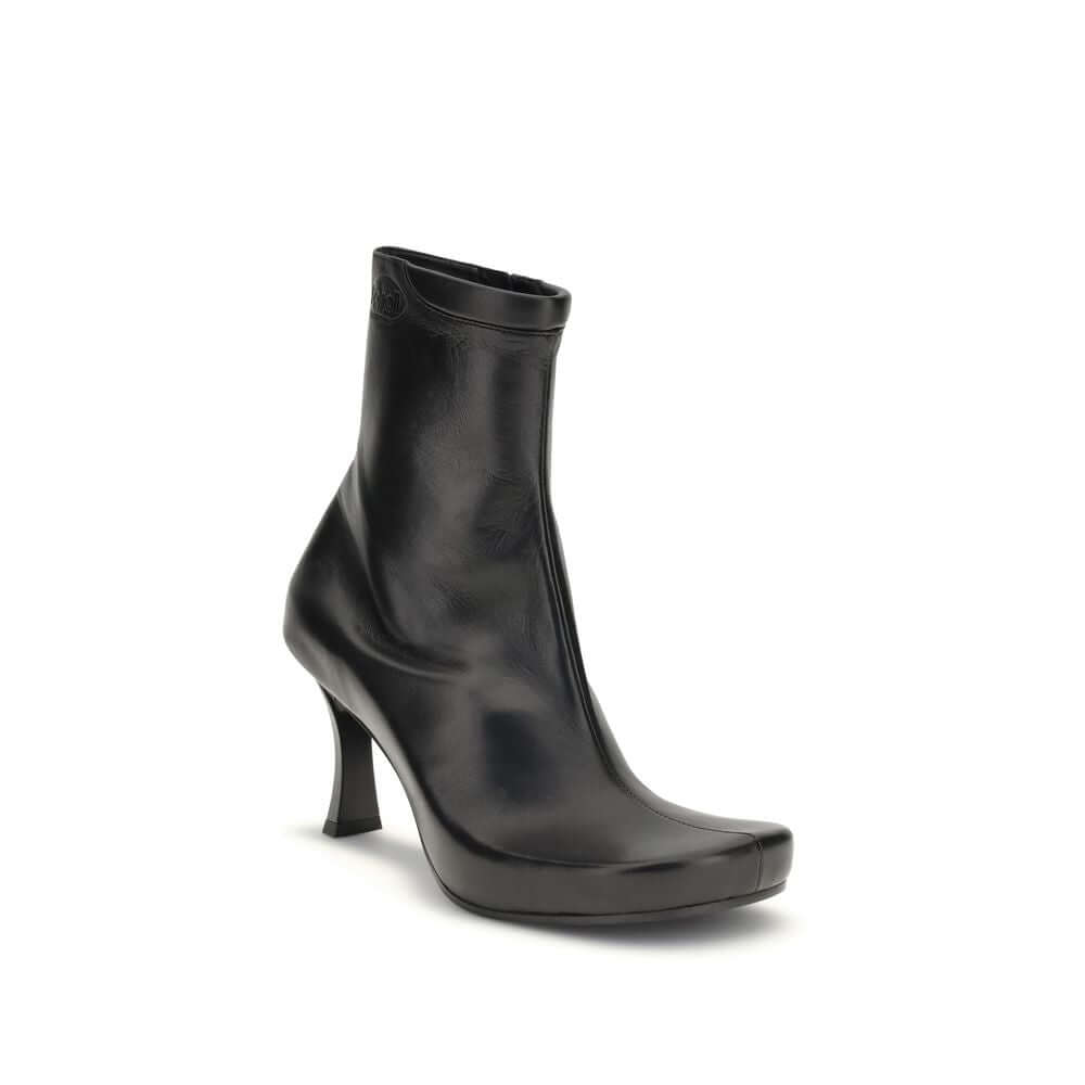 Balenciaga Black Calf Leather Bos Taurus Ankle Boots with square toe and logo-embossed design, showcasing ergonomic comfort and style.