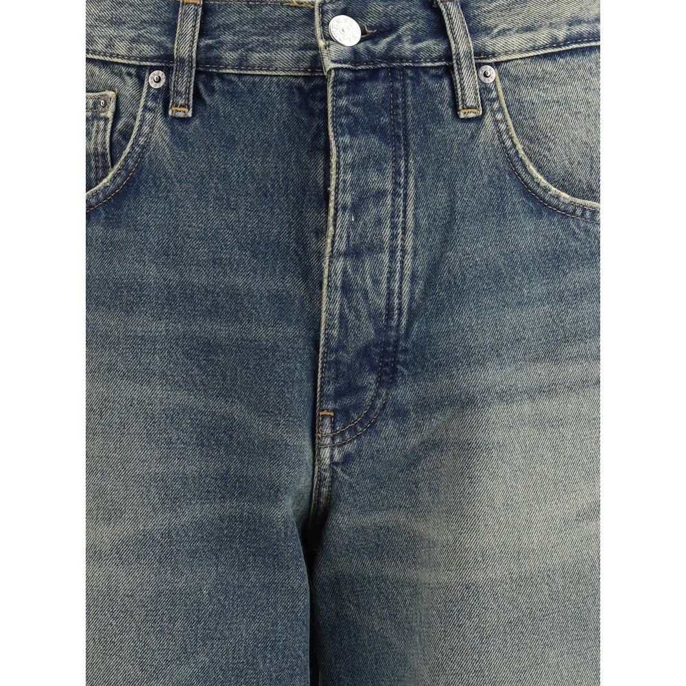 Close-up of Sunflower Blue Cotton Jeans Denim with wide twist and vintage wash effect.