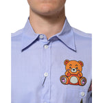 Dolce & Gabbana Light Blue Cotton Teddy Bear Long Sleeve Shirt with teddy bear appliqué on chest.