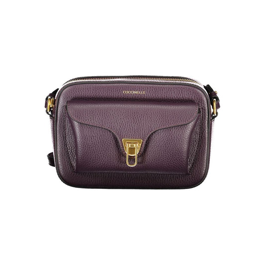 Coccinelle Purple Leather Women Handbag with adjustable strap, twist closure, external and internal pockets, Italian craftsmanship.