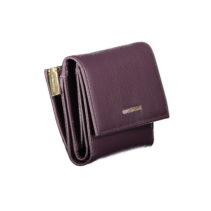 Coccinelle Purple Leather Women Wallet with zip and snap closure, elegant Italian design, featuring multiple compartments for cards and coins.