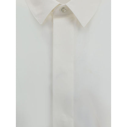 Close-up of Saint Laurent White Cotton Dress Shirt with classic collar and concealed buttons, featuring elegant and sophisticated design.