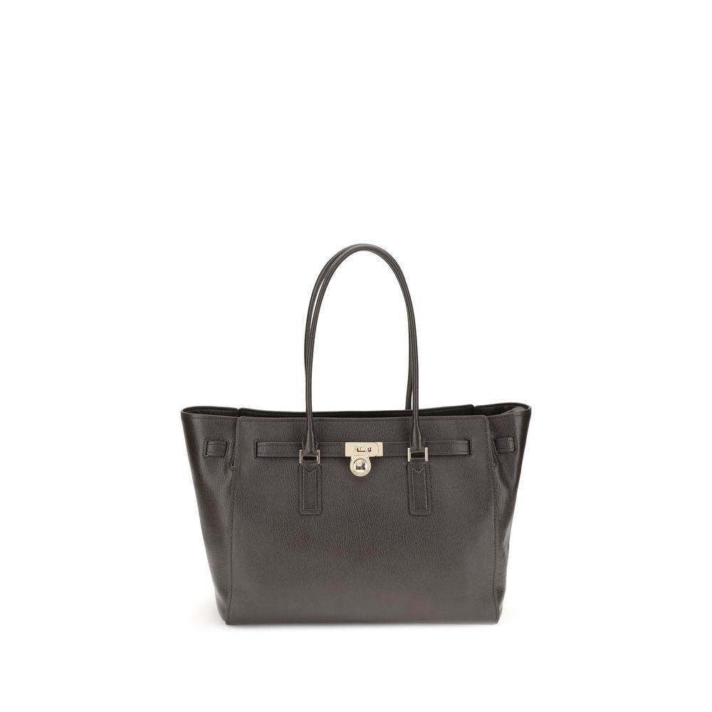 Front view with bag zipped and handles upright.