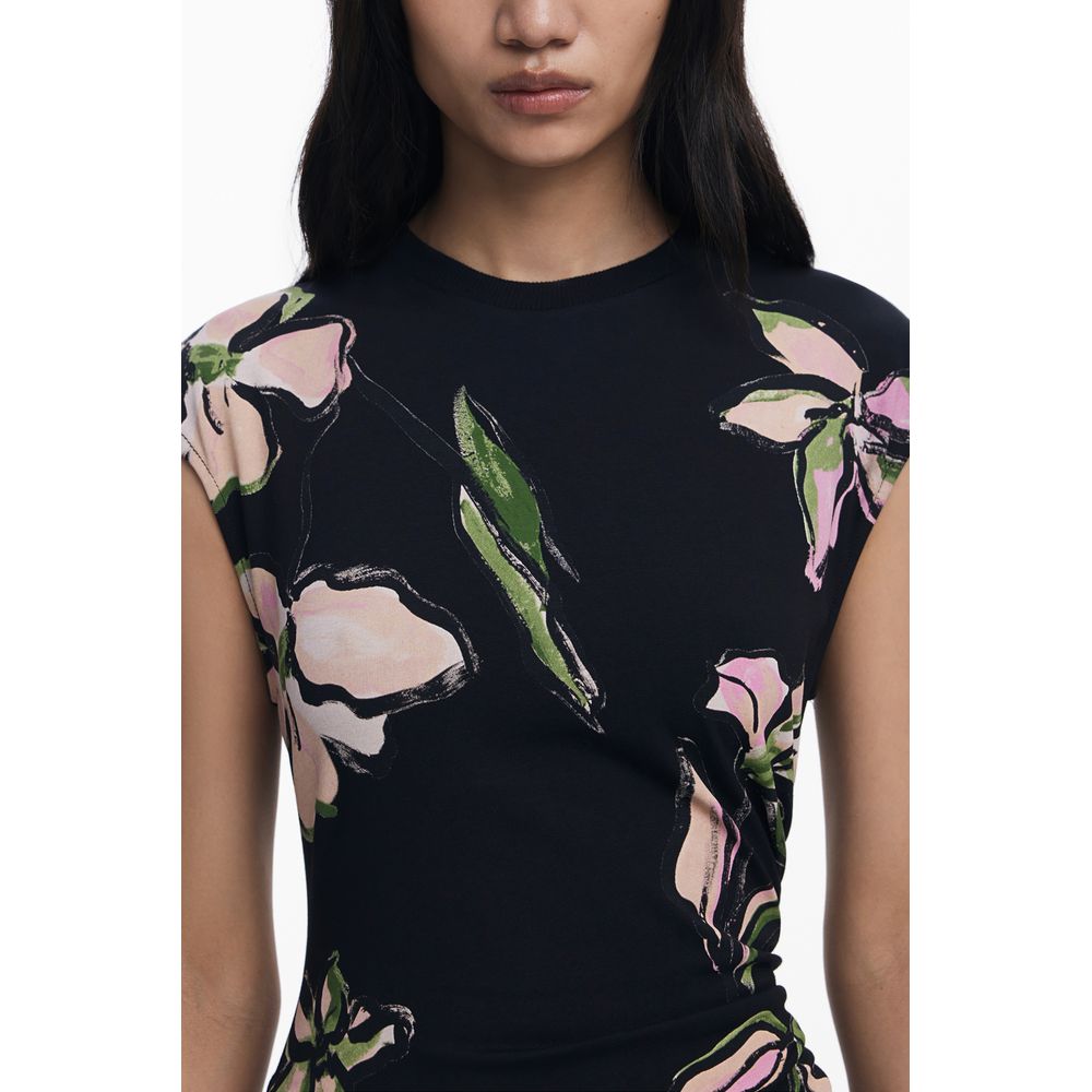 Model wearing Desigual Black Cotton Women Dress with floral print, short sleeves, and crew neck, showcasing modern fashion elegance.