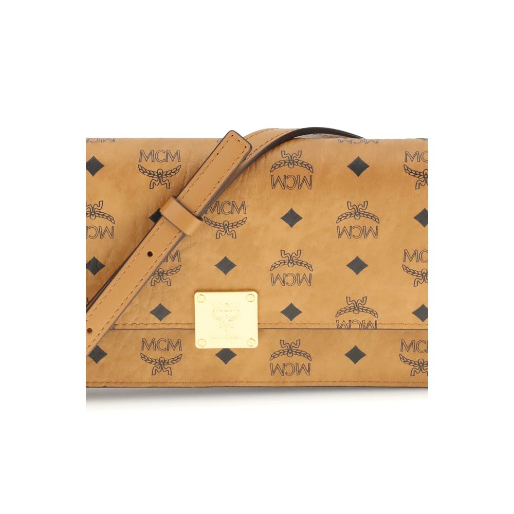 MCM Beige Fabric Wallet with Visetos pattern, metallic logo, and removable leather strap. Features pockets and magnetic closure.