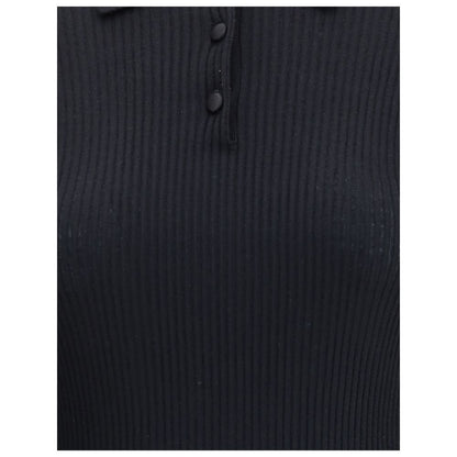 Dolce & Gabbana Black Cashmere Polo Shirt with ribbed design and three-button closure for a refined and versatile style.