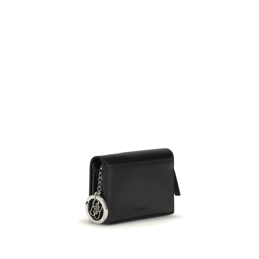 Ganni Black Recycled Leather Wallet with puppy print, multiple compartments, Ganni butterfly logo, and silver key ring for functionality and style.