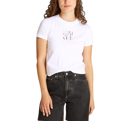 Woman wearing Calvin Klein Jeans White Recycled Cotton T-Shirt with front graphic detail.