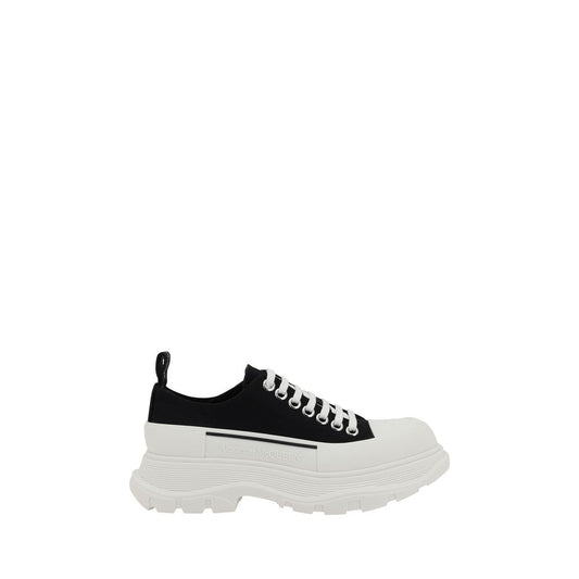 Alexander McQueen Black Rubber Chunky Sneakers with reinforced round toe and contrasting platform sole, side view.