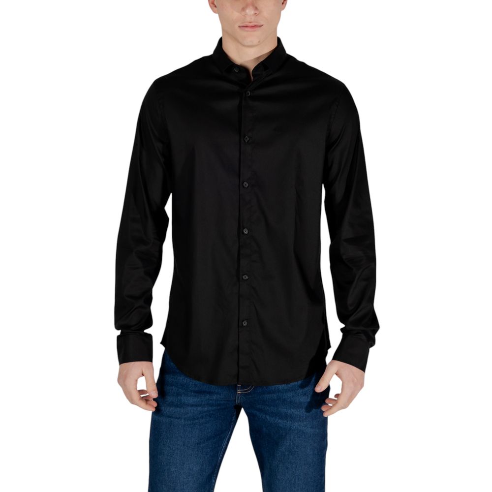 Man wearing Armani Exchange Black Lyocell Shirt with long sleeves and modern cut, suitable for formal and casual occasions.