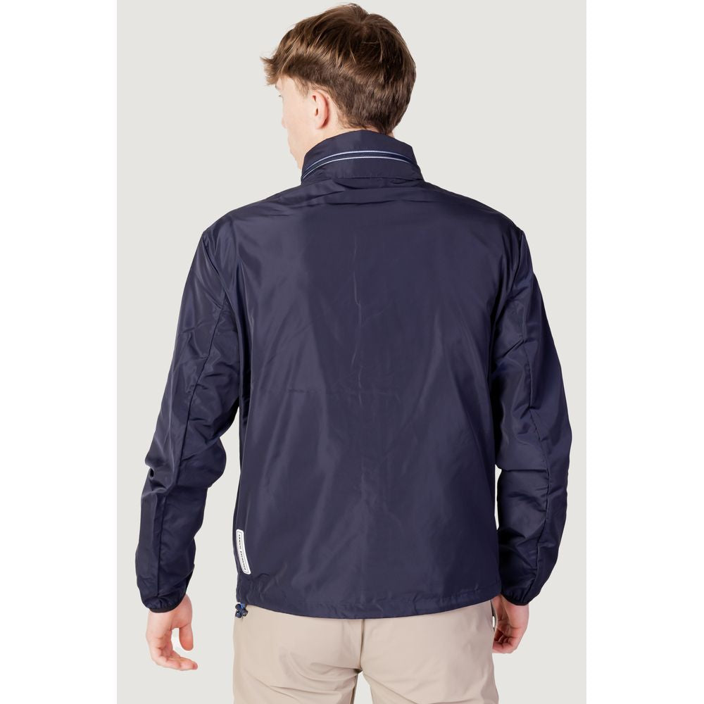 Back view of Armani Exchange Blue Polyester Shell Jacket with double-slider zip and reflective details.