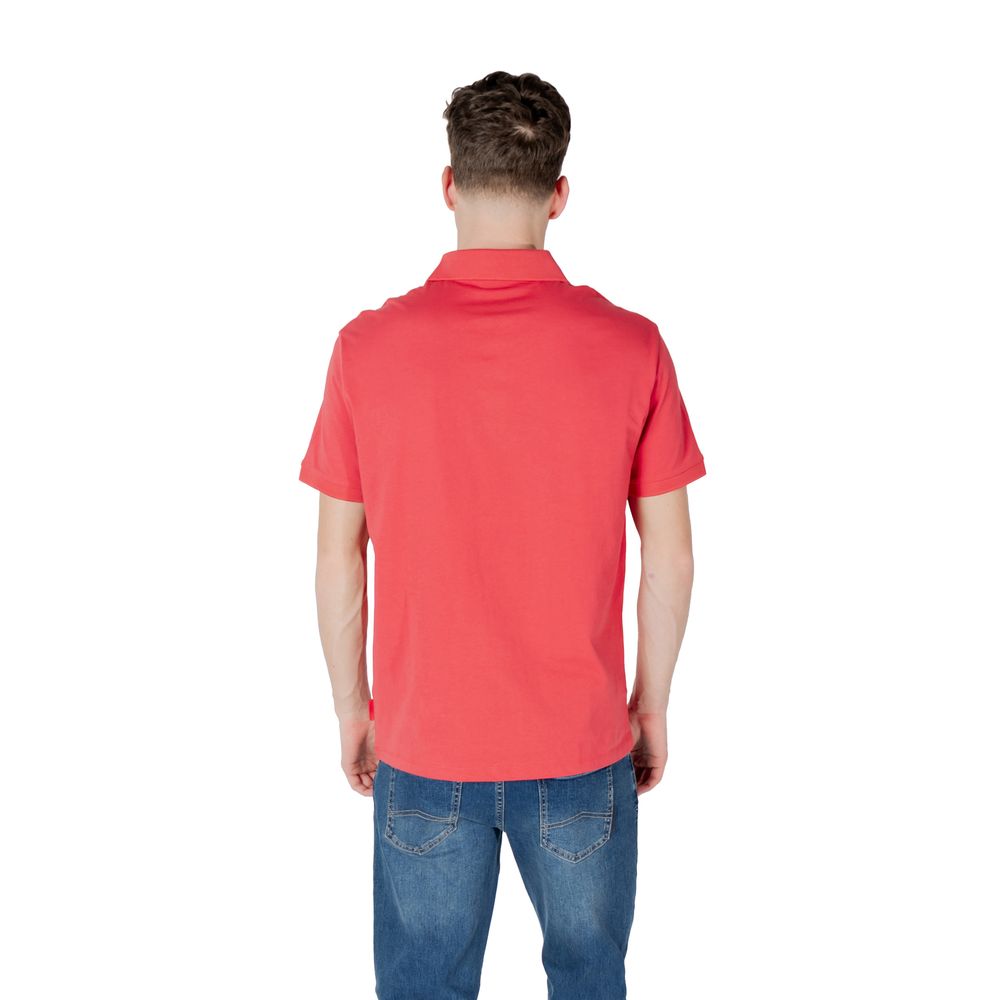 Back view of Armani Exchange Red Cotton Polo Shirt worn by a male model in jeans, illustrating casual elegance and regular fit style.