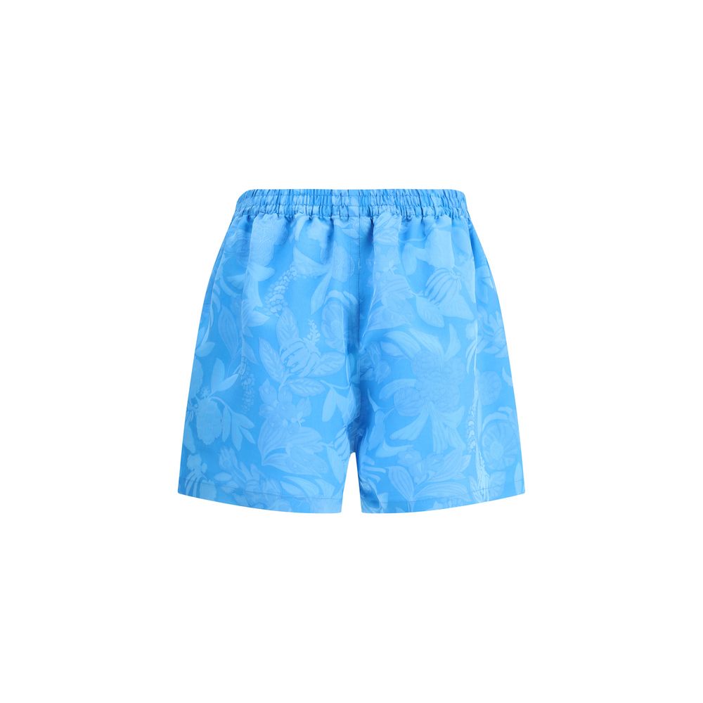 Balenciaga Blue Viscose Bermuda Shorts with floral pattern and elastic waistband, perfect for a bold summer look.
