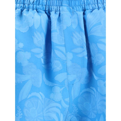 Balenciaga Blue Viscose Bermuda Shorts with floral pattern and elastic waistband, perfect for a stylish summer look.