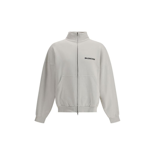 Balenciaga White Cotton Sweatshirt with logo and two patch pockets, a blend of contemporary design and classic style.