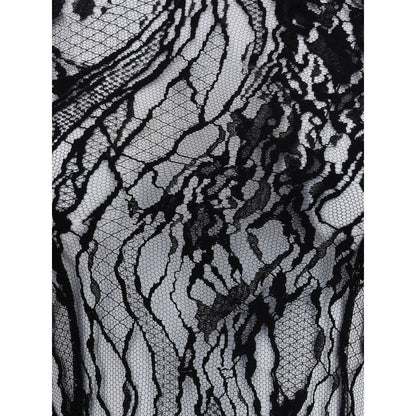 Close-up of sheer lace detail on Balmain Black Cotton Top, highlighting intricate design for a bold feminine look. Season AW25.