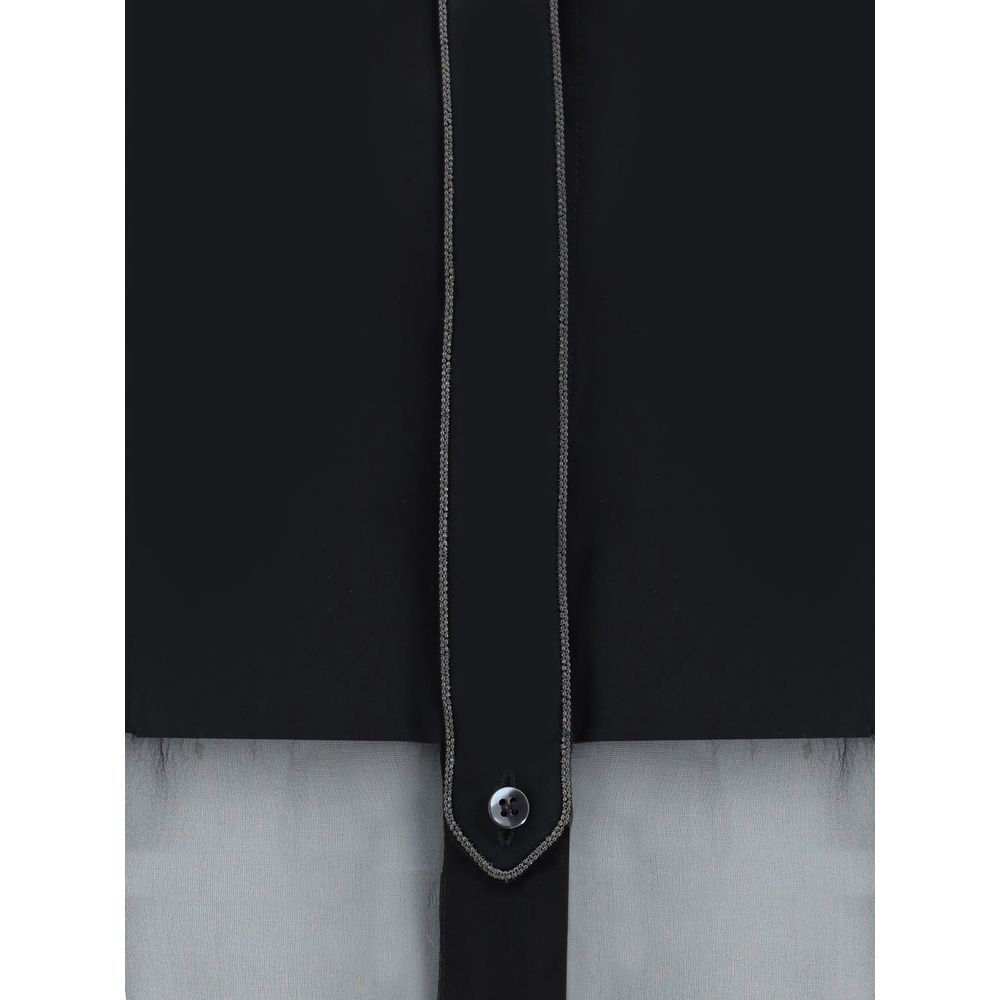 Close-up of Brunello Cucinelli Black Cotton Pattern Shirt with button detail and semi-transparent design.