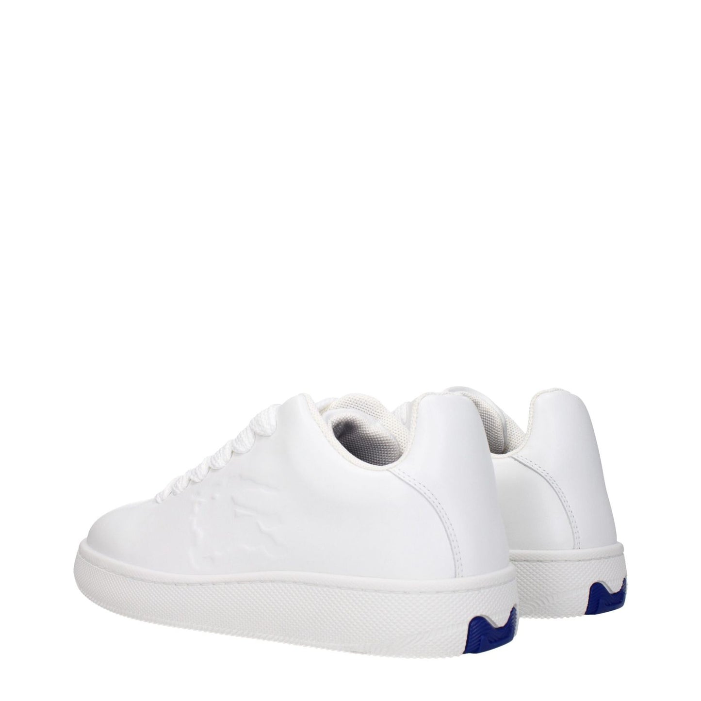 Burberry White Leather Low Top Sneakers with lace up closure and rubber sole, side detail view. Sporty Glam style.