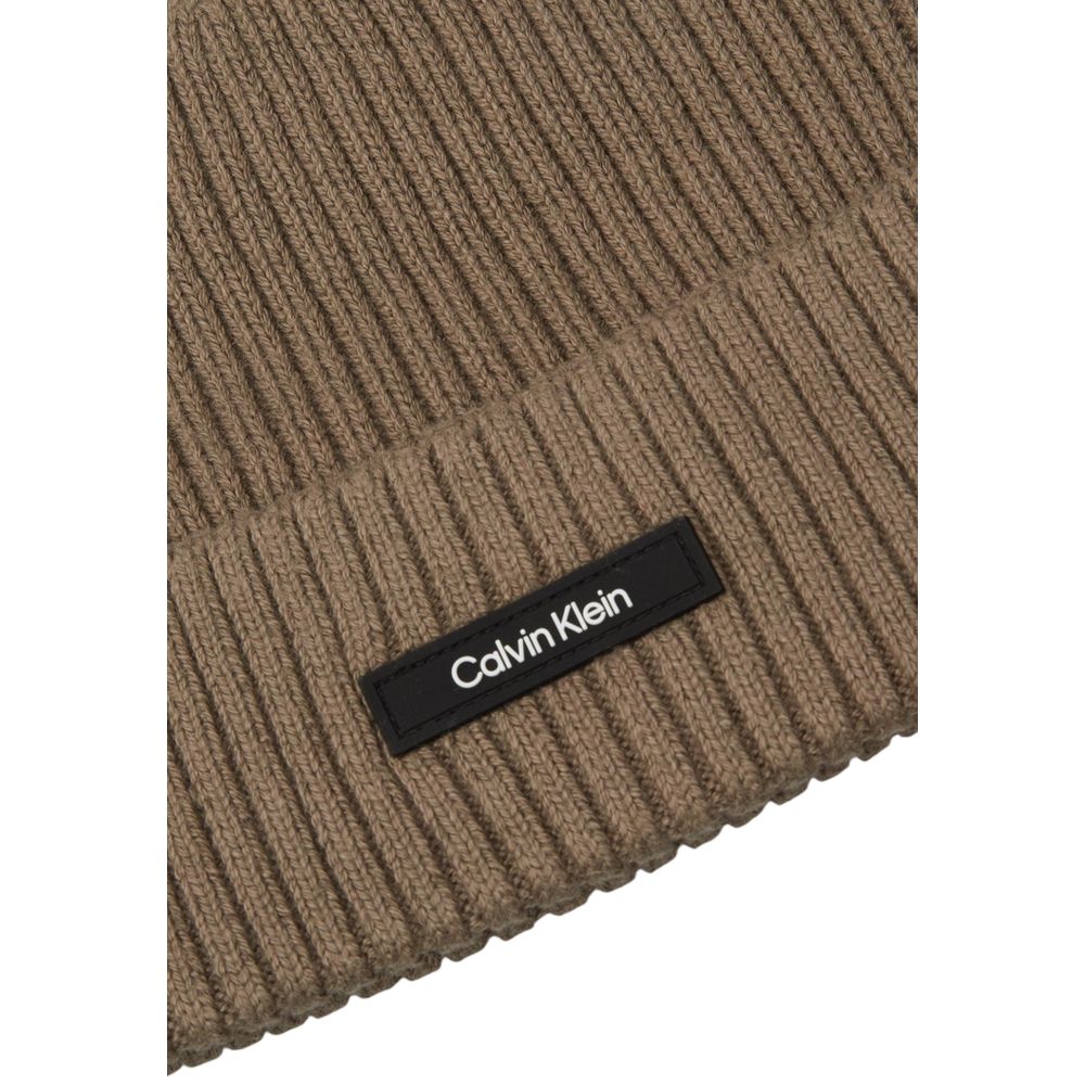 Calvin Klein Beige Organic Cotton Cap (Baseball Hat) close-up showing ribbed design and Calvin Klein logo.