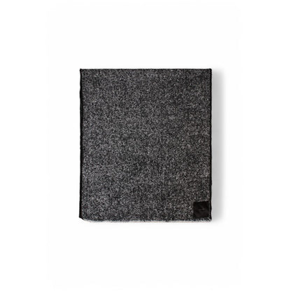 Calvin Klein Black And White Polyester Scarf featuring minimalist design and exceptional softness for versatile styling options.