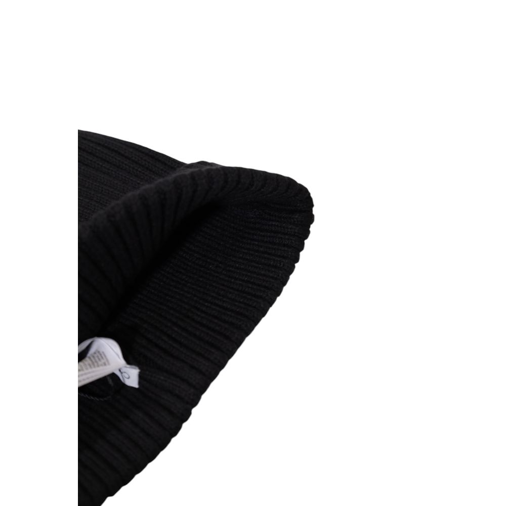 Close-up of Calvin Klein CLASSIC COTTON RIB BEANIE in black, featuring ribbed detail for snug fit, ideal for winter warmth and style.